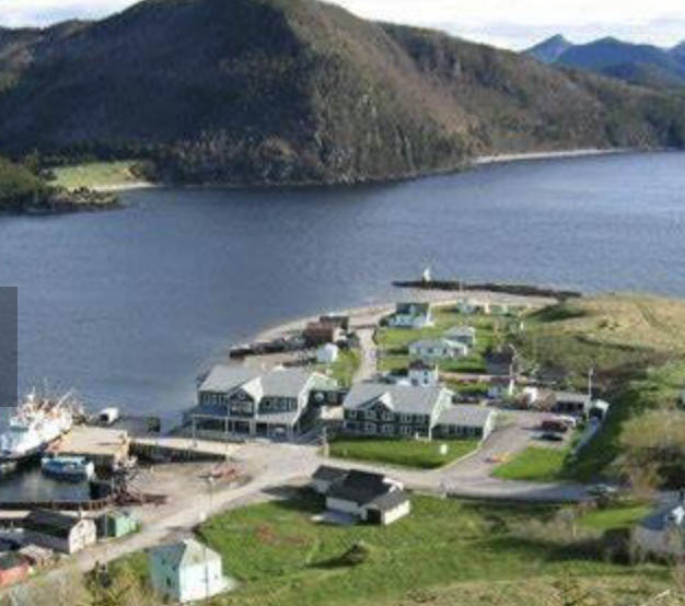 Caption: Dr. Jeff Keshen, vice-president (Grenfell Campus) is given a tour of Bonne Bay Aquarium & Research Station by its director Duncan McIlroy.