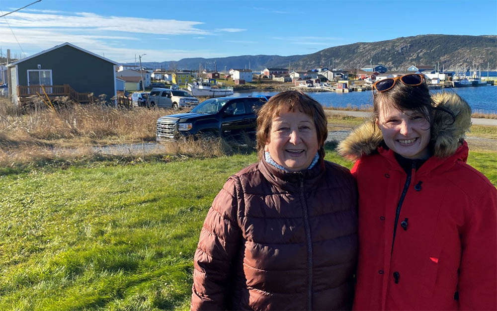 Joan Simmonds (Manager of French Shore Interpretation Centre) and Sara Langer (Transdisciplinary Sustainability PhD candidate) in Conche, November 2024